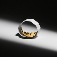 Paper Ring and Golden Teeth